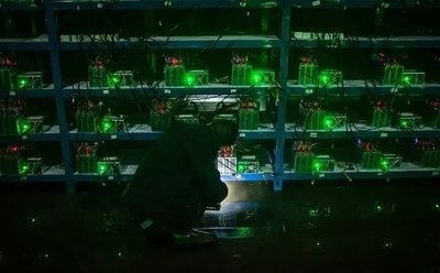 A mining farm with rows of mining rigs. 